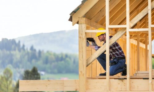 roofer-builder-working-on-roof-structure-at-construction-site.jpg